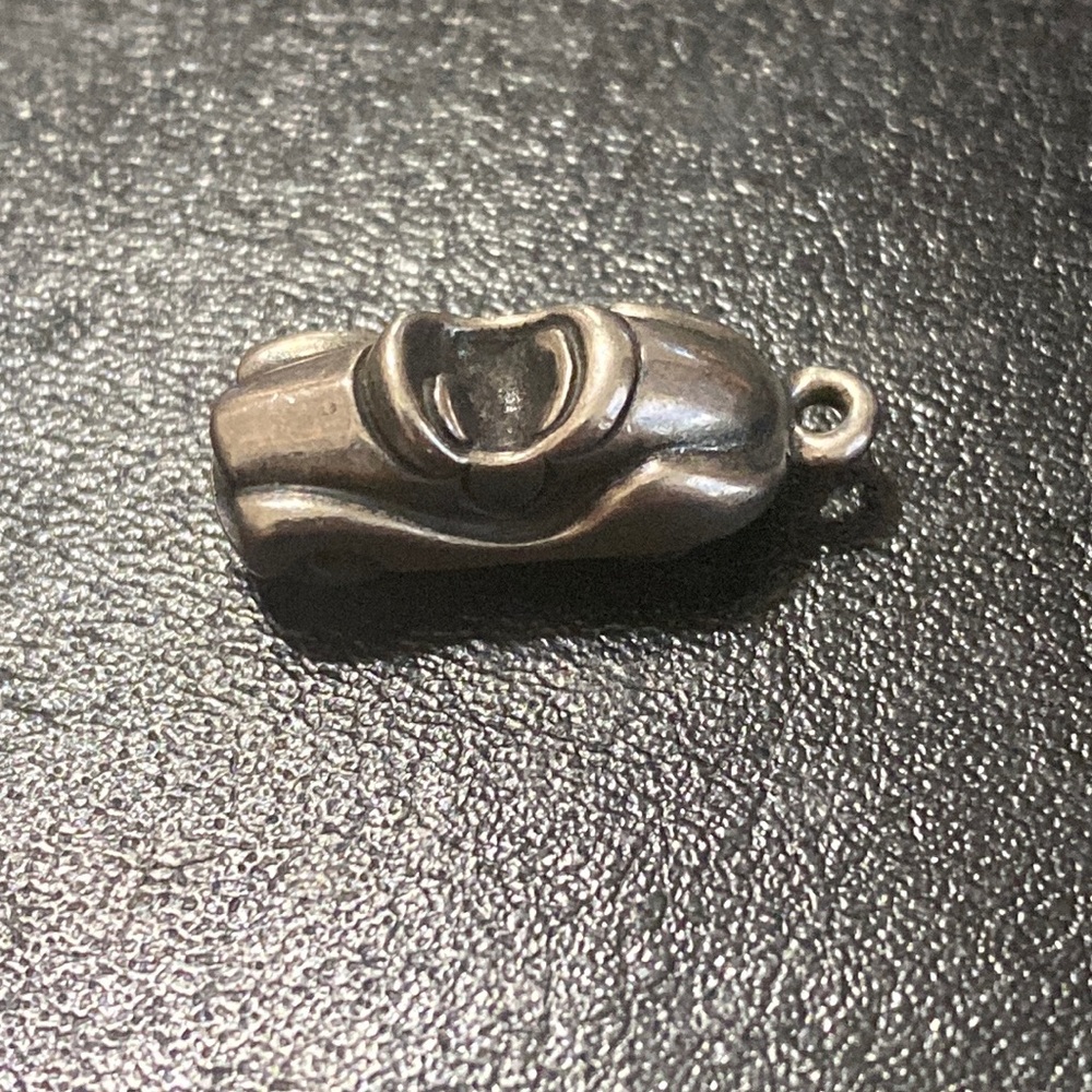Vintage, retired James Avery roadster charm
